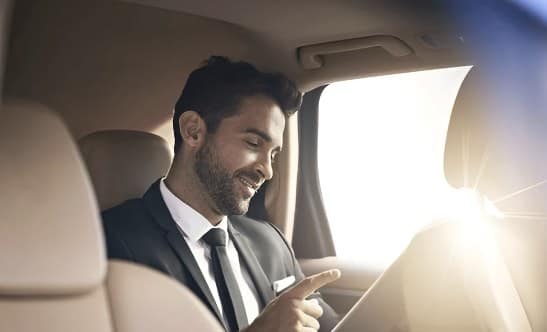 Passenger relaxing in a Diamond Cars Camberley taxi